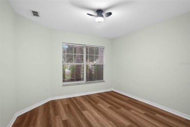 Discover the charm and elegance of this beautifully updated home on Arlington Ridge Golf Club in Florida - for sale on GolfHomes.com, golf home, golf lot