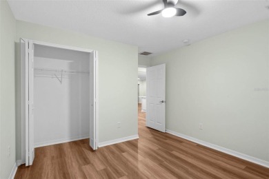 Discover the charm and elegance of this beautifully updated home on Arlington Ridge Golf Club in Florida - for sale on GolfHomes.com, golf home, golf lot