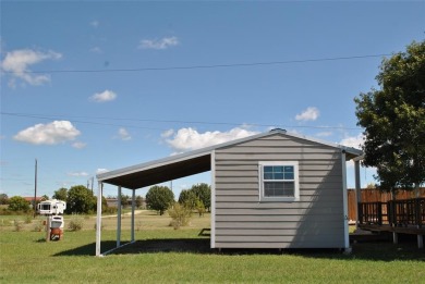 Dive into beautiful Lake Proctor, just a stone's throw from this on P.A.R. Country Club in Texas - for sale on GolfHomes.com, golf home, golf lot