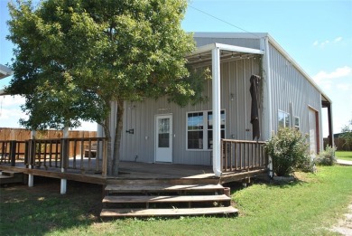 Dive into beautiful Lake Proctor, just a stone's throw from this on P.A.R. Country Club in Texas - for sale on GolfHomes.com, golf home, golf lot