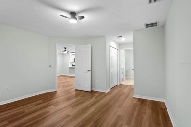 Discover the charm and elegance of this beautifully updated home on Arlington Ridge Golf Club in Florida - for sale on GolfHomes.com, golf home, golf lot