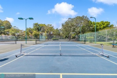 Welcome to this beautifully renovated 2-bedroom, 2-bath with on Oaks Country Club in Florida - for sale on GolfHomes.com, golf home, golf lot