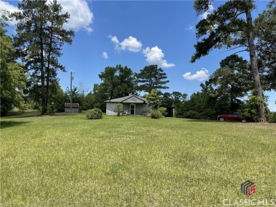 Surveyed at 95.25 acres with almost 836 ft of paved road on Uncle Remus Golf Course in Georgia - for sale on GolfHomes.com, golf home, golf lot