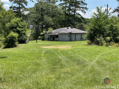 Surveyed at 95.25 acres with almost 836 ft of paved road on Uncle Remus Golf Course in Georgia - for sale on GolfHomes.com, golf home, golf lot