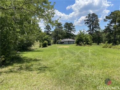 Surveyed at 95.25 acres with almost 836 ft of paved road on Uncle Remus Golf Course in Georgia - for sale on GolfHomes.com, golf home, golf lot