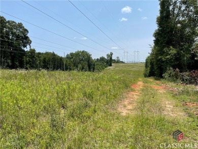 Surveyed at 95.25 acres with almost 836 ft of paved road on Uncle Remus Golf Course in Georgia - for sale on GolfHomes.com, golf home, golf lot