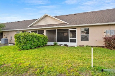 Discover the charm and elegance of this beautifully updated home on Arlington Ridge Golf Club in Florida - for sale on GolfHomes.com, golf home, golf lot