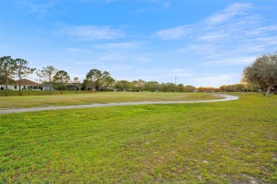 Discover the charm and elegance of this beautifully updated home on Arlington Ridge Golf Club in Florida - for sale on GolfHomes.com, golf home, golf lot