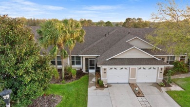 Discover the charm and elegance of this beautifully updated home on Arlington Ridge Golf Club in Florida - for sale on GolfHomes.com, golf home, golf lot