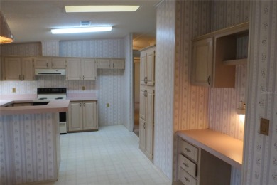 BETMAR ESTATES (55+ Community) 3BR/2BA/HUGE CARPORT Home with on Betmar Acres Golf Club in Florida - for sale on GolfHomes.com, golf home, golf lot