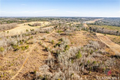 Surveyed at 95.25 acres with almost 836 ft of paved road on Uncle Remus Golf Course in Georgia - for sale on GolfHomes.com, golf home, golf lot