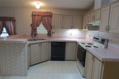 BETMAR ESTATES (55+ Community) 3BR/2BA/HUGE CARPORT Home with on Betmar Acres Golf Club in Florida - for sale on GolfHomes.com, golf home, golf lot