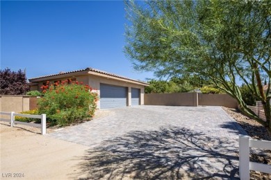 This luxurious single-family residence sits on a .49-acre corner on Painted Desert Golf Club in Nevada - for sale on GolfHomes.com, golf home, golf lot