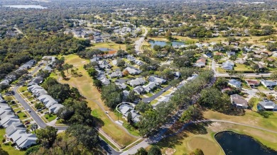 Under contract-accepting backup offers. Casual Coastal elegance on Highland Lakes Executive Golf Course in Florida - for sale on GolfHomes.com, golf home, golf lot