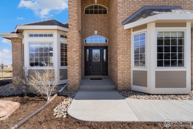 A rare blend of luxury, space, and location, this custom brick on Ptarmigan Golf Course in Colorado - for sale on GolfHomes.com, golf home, golf lot