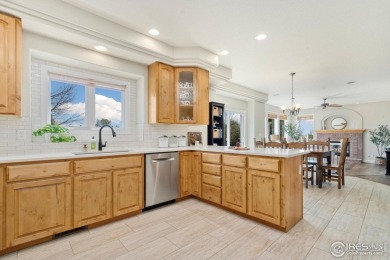 A rare blend of luxury, space, and location, this custom brick on Ptarmigan Golf Course in Colorado - for sale on GolfHomes.com, golf home, golf lot