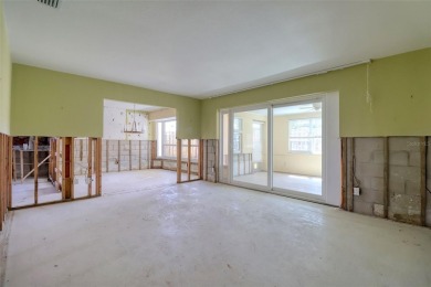 Under contract-accepting backup offers. This three-bedroom two on Pasadena Yacht and Country Club in Florida - for sale on GolfHomes.com, golf home, golf lot