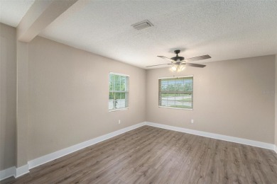 Move-in ready and priced to sell! This beautifully updated on Mangrove Bay Golf Course in Florida - for sale on GolfHomes.com, golf home, golf lot
