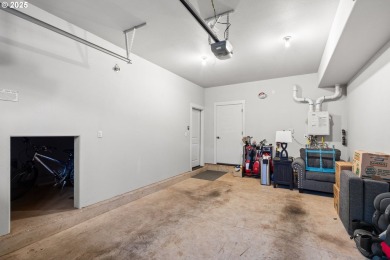 Calling all golf lovers! This lovely tri-level contemporary on  in Oregon - for sale on GolfHomes.com, golf home, golf lot