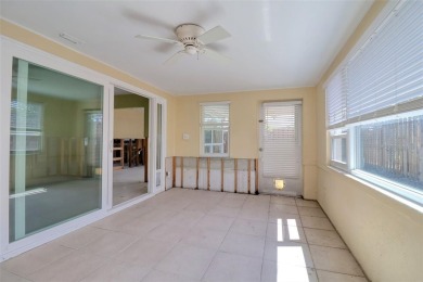 Under contract-accepting backup offers. This three-bedroom two on Pasadena Yacht and Country Club in Florida - for sale on GolfHomes.com, golf home, golf lot