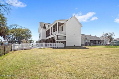 This raised house, perched gracefully on a 1-acre lot, offers an on Pass Christian Isles Golf Club in Mississippi - for sale on GolfHomes.com, golf home, golf lot