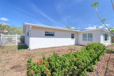 Under contract-accepting backup offers. This three-bedroom two on Pasadena Yacht and Country Club in Florida - for sale on GolfHomes.com, golf home, golf lot