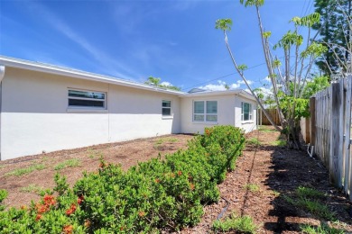 Under contract-accepting backup offers. This three-bedroom two on Pasadena Yacht and Country Club in Florida - for sale on GolfHomes.com, golf home, golf lot