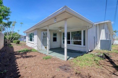 Under contract-accepting backup offers. This three-bedroom two on Pasadena Yacht and Country Club in Florida - for sale on GolfHomes.com, golf home, golf lot