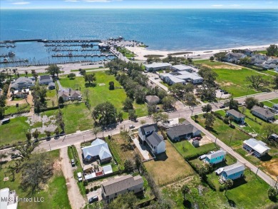 This raised house, perched gracefully on a 1-acre lot, offers an on Pass Christian Isles Golf Club in Mississippi - for sale on GolfHomes.com, golf home, golf lot