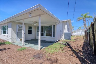 Under contract-accepting backup offers. This three-bedroom two on Pasadena Yacht and Country Club in Florida - for sale on GolfHomes.com, golf home, golf lot