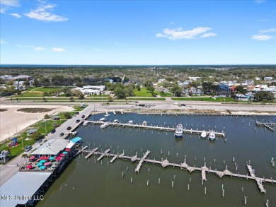 This raised house, perched gracefully on a 1-acre lot, offers an on Pass Christian Isles Golf Club in Mississippi - for sale on GolfHomes.com, golf home, golf lot