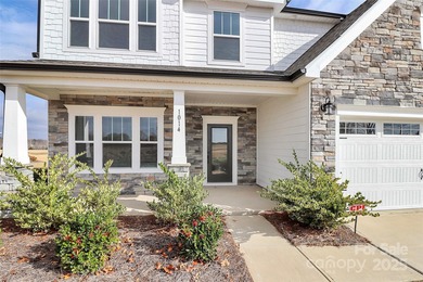 Stunning, never-lived-in former model home in Stonebridge on Stonebridge Golf Club in North Carolina - for sale on GolfHomes.com, golf home, golf lot