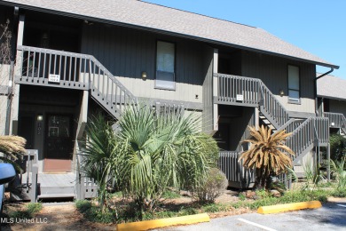 Don't miss out on this inviting ground-level condo offering on Diamondhead Country Club in Mississippi - for sale on GolfHomes.com, golf home, golf lot