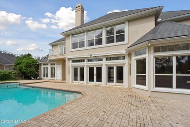 Experience luxury living in this exquisite estate in the on Hidden Hills Country Club in Florida - for sale on GolfHomes.com, golf home, golf lot