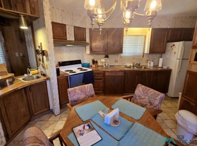 Adorable 3-Bedroom, 2-Bath Home - Walk to the Marina! Curb on Sierra Del Rio Golf Club in New Mexico - for sale on GolfHomes.com, golf home, golf lot