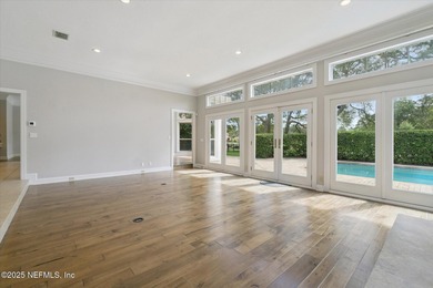 Experience luxury living in this exquisite estate in the on Hidden Hills Country Club in Florida - for sale on GolfHomes.com, golf home, golf lot