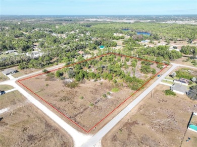 Discover Your Slice of Paradise in Lehigh Acres! Nestled in a on Mirror Lakes Golf Club in Florida - for sale on GolfHomes.com, golf home, golf lot