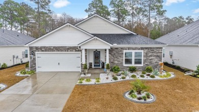 Discover your dream home in the highly desirable Clear Pond on Myrtle Beach National Golf Course in South Carolina - for sale on GolfHomes.com, golf home, golf lot