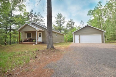 Welcome to your serene Northwoods escape in the heart of Voyager on Voyager Village Country Club - Voyager in Wisconsin - for sale on GolfHomes.com, golf home, golf lot