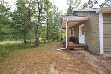 Welcome to your serene Northwoods escape in the heart of Voyager on Voyager Village Country Club - Voyager in Wisconsin - for sale on GolfHomes.com, golf home, golf lot