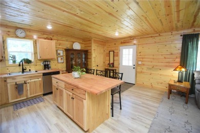 Welcome to your serene Northwoods escape in the heart of Voyager on Voyager Village Country Club - Voyager in Wisconsin - for sale on GolfHomes.com, golf home, golf lot