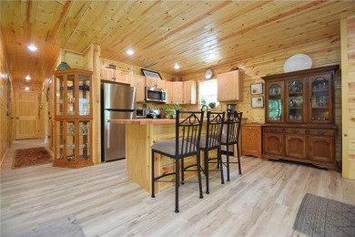 Welcome to your serene Northwoods escape in the heart of Voyager on Voyager Village Country Club - Voyager in Wisconsin - for sale on GolfHomes.com, golf home, golf lot