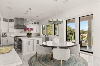 Experience modern coastal elegance in this architecturally on Tiger Point Golf and Country Club in Florida - for sale on GolfHomes.com, golf home, golf lot