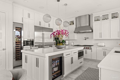 Experience modern coastal elegance in this architecturally on Tiger Point Golf and Country Club in Florida - for sale on GolfHomes.com, golf home, golf lot