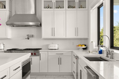 Experience modern coastal elegance in this architecturally on Tiger Point Golf and Country Club in Florida - for sale on GolfHomes.com, golf home, golf lot