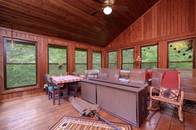 Tucked into the wooded hillside at the end of long ascending on Eagle Ridge Inn and Resort in Illinois - for sale on GolfHomes.com, golf home, golf lot