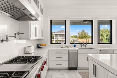 Experience modern coastal elegance in this architecturally on Tiger Point Golf and Country Club in Florida - for sale on GolfHomes.com, golf home, golf lot