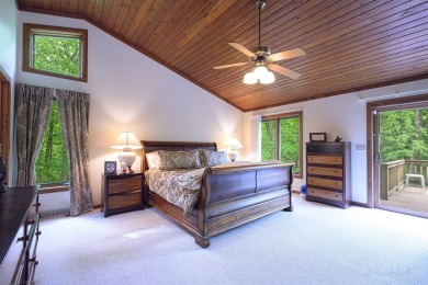 Tucked into the wooded hillside at the end of long ascending on Eagle Ridge Inn and Resort in Illinois - for sale on GolfHomes.com, golf home, golf lot