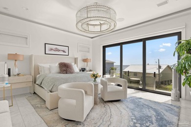 Experience modern coastal elegance in this architecturally on Tiger Point Golf and Country Club in Florida - for sale on GolfHomes.com, golf home, golf lot