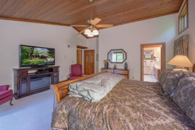 Tucked into the wooded hillside at the end of long ascending on Eagle Ridge Inn and Resort in Illinois - for sale on GolfHomes.com, golf home, golf lot